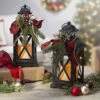 Set Of 2 Battery Operated Lighted Christmas Metal Holiday Lanterns With Floral Accents And Timer 1 Set Of 2 Battery Operated Lighted Christmas Metal Holiday Lanterns With Floral Accents And Timer -Solar Christmas Holiday Shop 2491810 main image