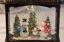 11 Inch Decorative Bronze Water Lantern With Snow Family Sledding In Swirling Glitter -Solar Christmas Holiday Shop 2499030 snowman inside