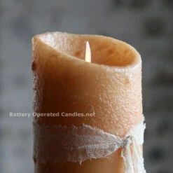 Moving Flame Primitive Oatmeal Candle Battery Operated 3.5 X 7 - Timer - Remote Ready 7 Moving Flame Primitive Oatmeal Candle Battery Operated 3.5 X 7 - Timer - Remote Ready -Solar Christmas Holiday Shop boc oatmeal detail