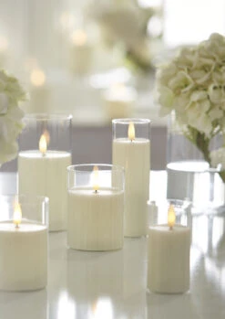 Clear Glass Flameless Candle 3 Inch X 4 Inch Ivory Pillar - Remote Ready 8 Clear Glass Flameless Candle 3 Inch X 4 Inch Ivory Pillar - Remote Ready -Solar Christmas Holiday Shop clear glass without remote 1