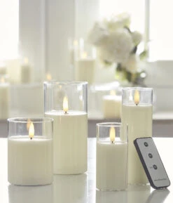 Clear Glass Flameless Candle 3.5 Inch X 6 Inch Ivory Pillar - Remote Ready 7 Clear Glass Flameless Candle 3.5 Inch X 6 Inch Ivory Pillar - Remote Ready -Solar Christmas Holiday Shop glass cylinder candles 2