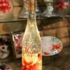 Lighted Wine Bottle With Swirling Glitter Hope Poinsettia Design With Cardinals Snow Globe -Solar Christmas Holiday Shop hope