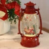 Red Hurricane With Santa And Sleigh Lighted Water Lantern - Timer -Solar Christmas Holiday Shop santa red hurricane water globe