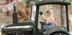 Lighted Green Tractor Water Lantern With Santa In Swirling Glitter -Solar Christmas Holiday Shop tractor close up