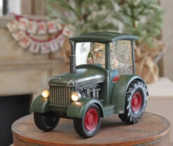 Lighted Green Tractor Water Lantern With Santa In Swirling Glitter -Solar Christmas Holiday Shop tractor front view