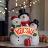 Snowmen With Light Up Welcome Sign - Battery Operated 8.6 Inch -Solar Christmas Holiday Shop welcome snowmen main