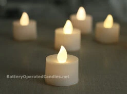 Tall Flameless Tea Lights Warm White LED Battery Operated 12 Pack - 5 Hour Timer 6 Tall Flameless Tea Lights Warm White LED Battery Operated 12 Pack - 5 Hour Timer -Solar Christmas Holiday Shop ww tall tealights alt image timer